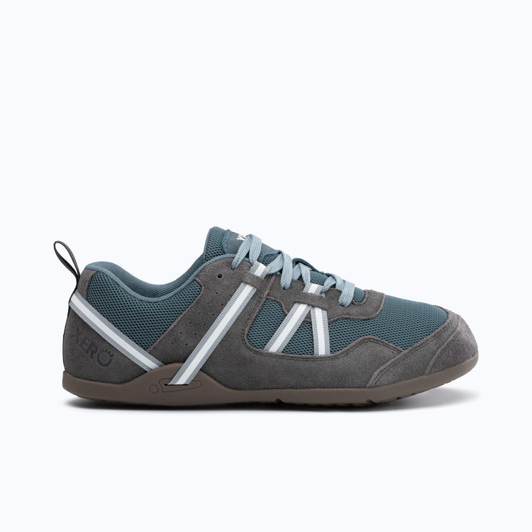 Xero Shoes Prio Men Shoe in Gray and Slate Blue Mesh with Gray and White Strap Wrapping Around the Heel and Side.Toe Facing Right